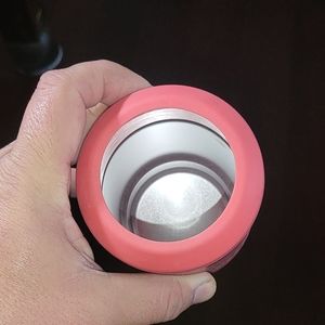 REDUCE BOTTLE HOLDER WITH CAP OPENER ON BOTTOM